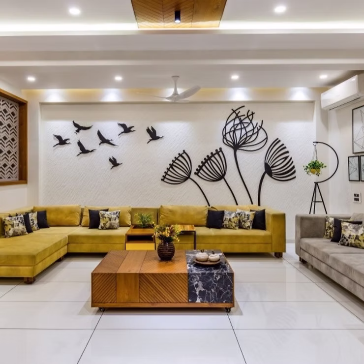 Gypsum cove false ceiling with warm LED lighting Madurai living room